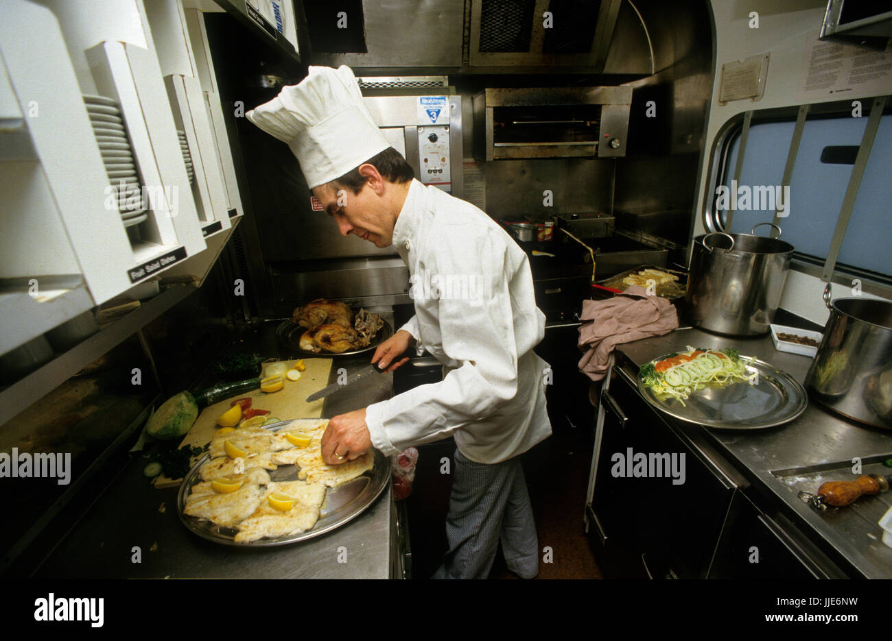 Train journey from London Paddington to Penzance in 1985. British Rail Intercity 125 train journey photographed for the Sunday Express Magazine with permission in 1985. Showing first and second class travel and silver service serving of lunch cooked onboard. Stock Photo