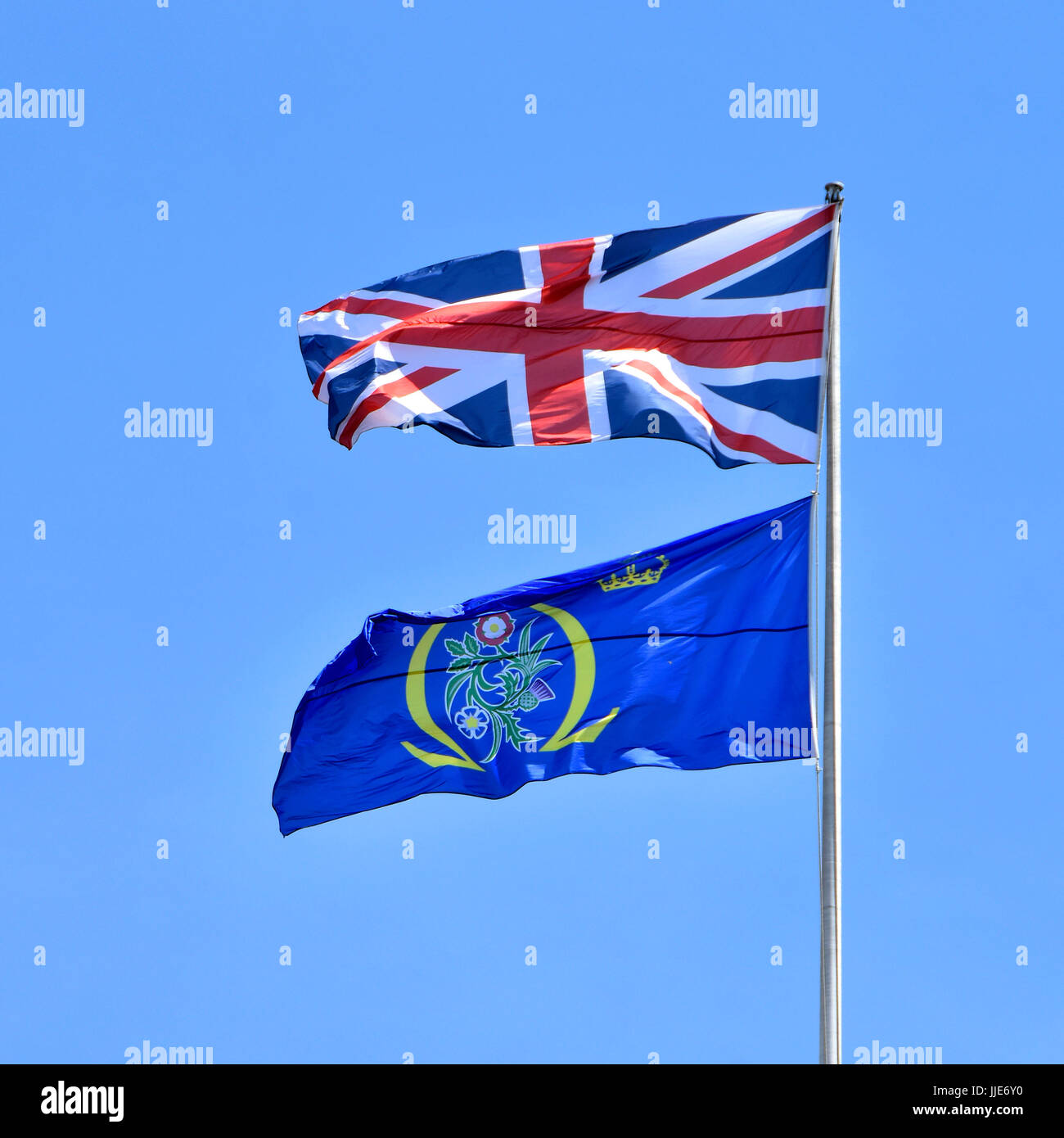 Supreme Court UK flag flying below Union Flag above The Supreme Court