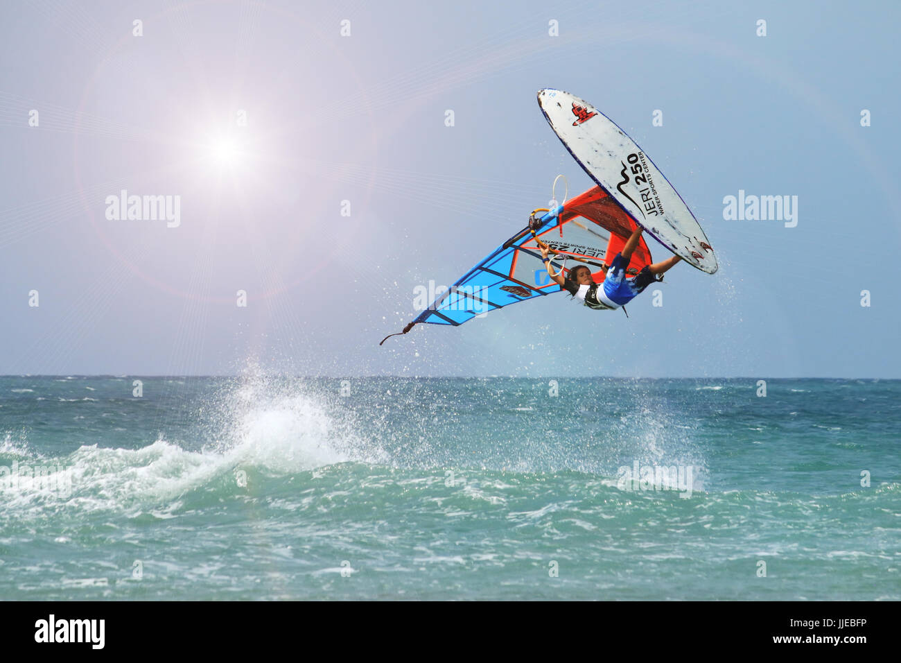 Extreme Windsurfing tricks by child Stock Photo Alamy