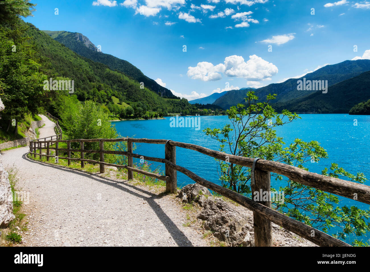Mountain Ledro lake and his bike path in the Italian Dolomites Stock Photo