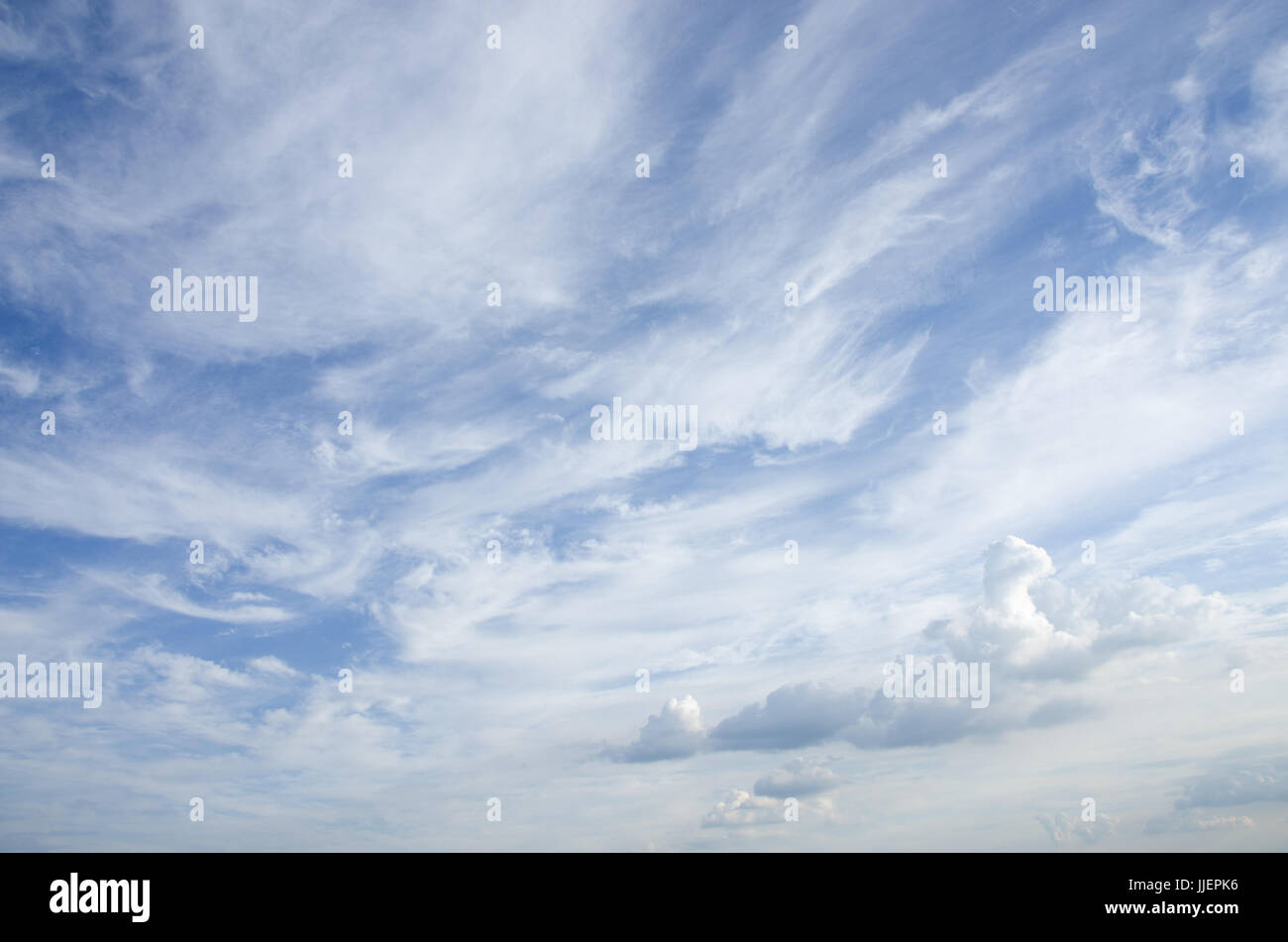 Blue sky with clouds on a sunny summer day Stock Photo - Alamy