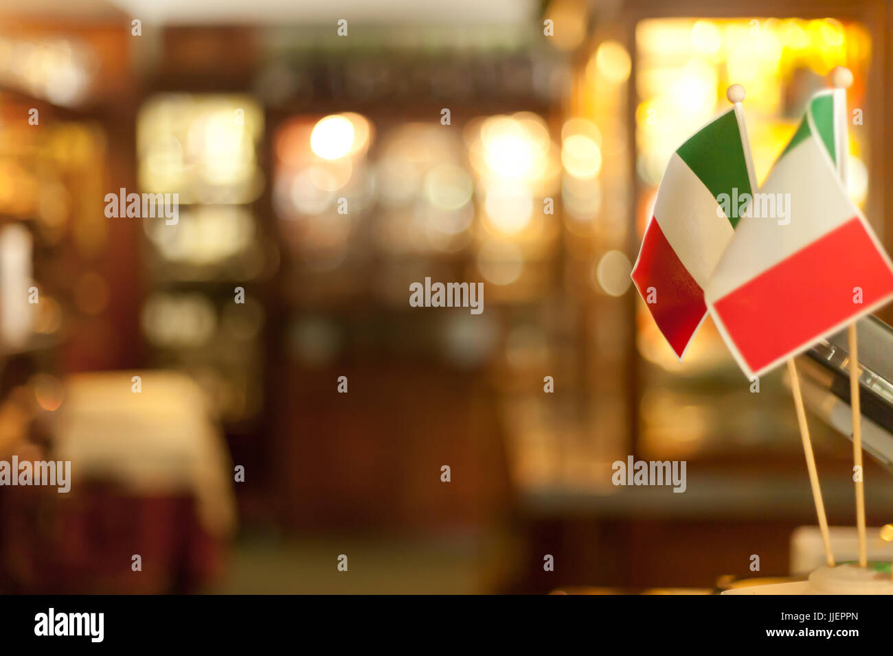 Italian Flags on Sticks close up in italian luxury restaurant dish decoration Stock Photo