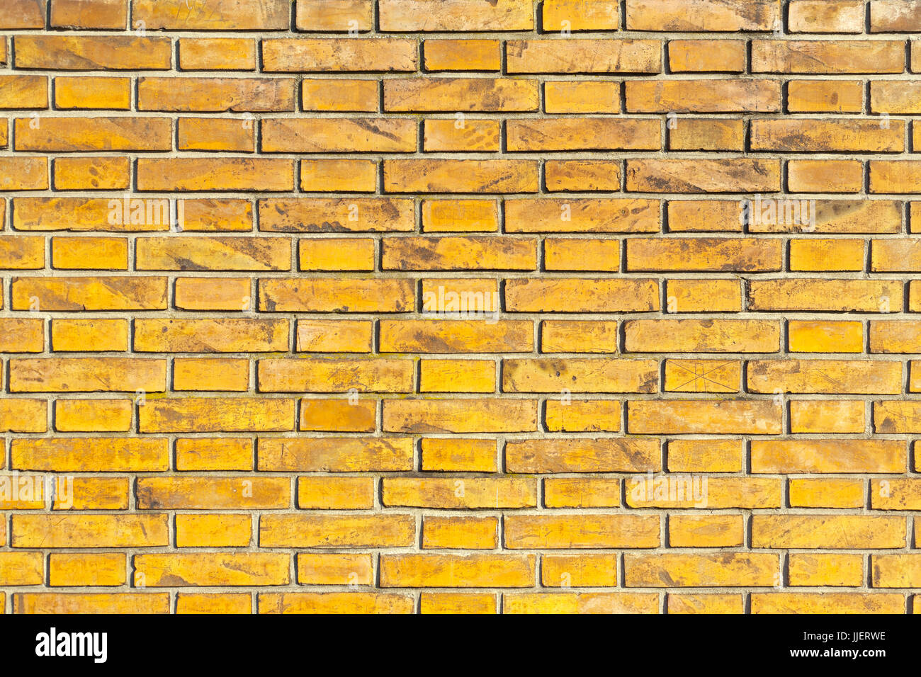 Orange Dirty Brick Wall in Italian City Street Stock Photo