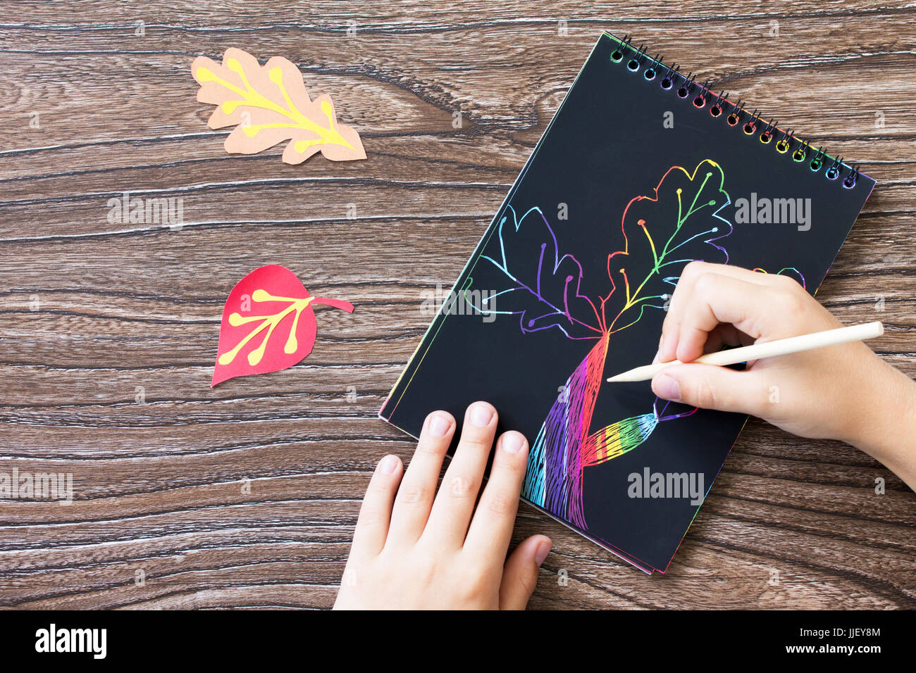 Autumn background. Children's creativity, drawing creation process ...