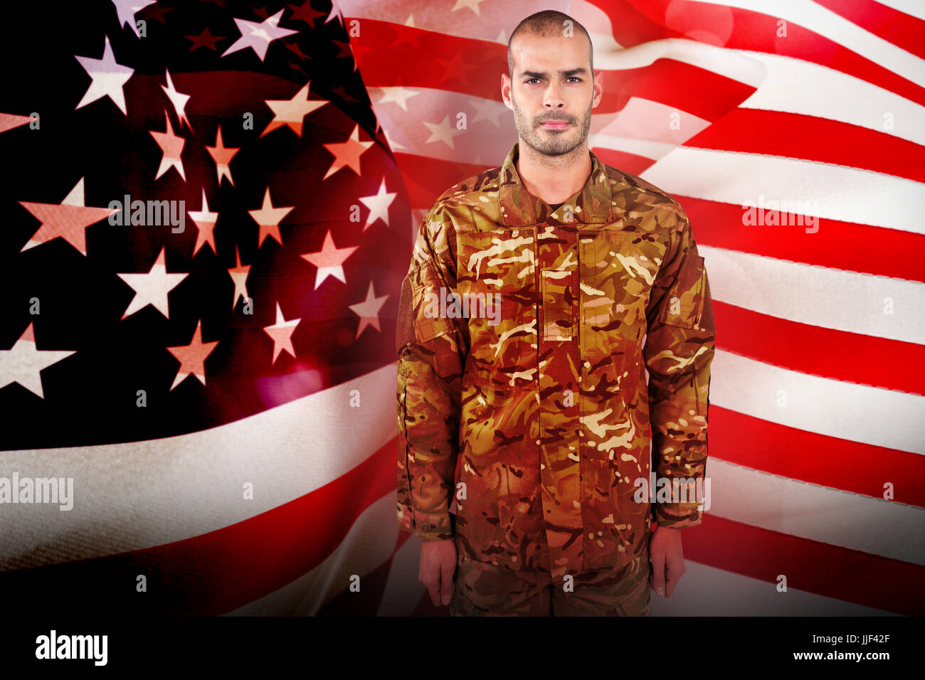Portrait of confident soldier standing against focus on usa flag Stock ...