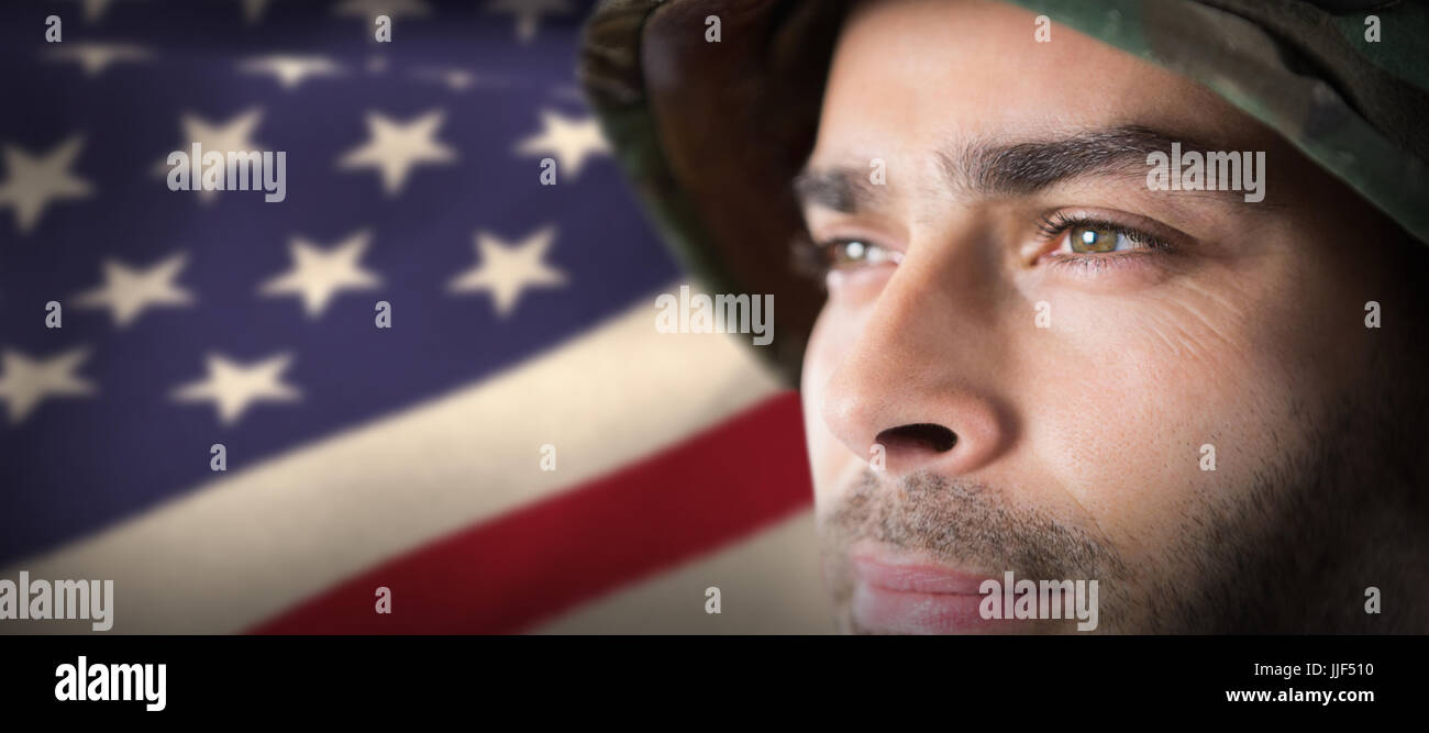 Close up of thoughtful soldier against cropped american flag Stock ...