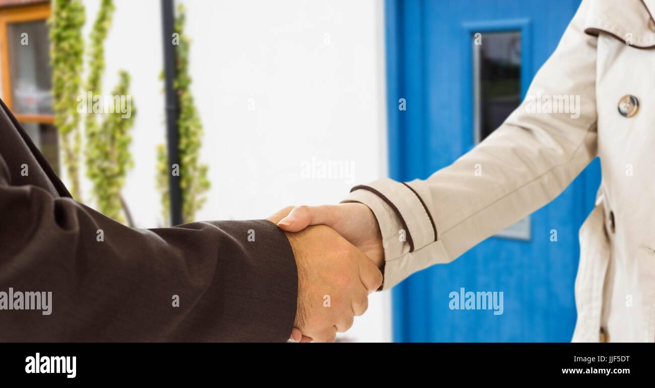 Front Handshake Digital composite of handshake in front of the door of the house Stock ...