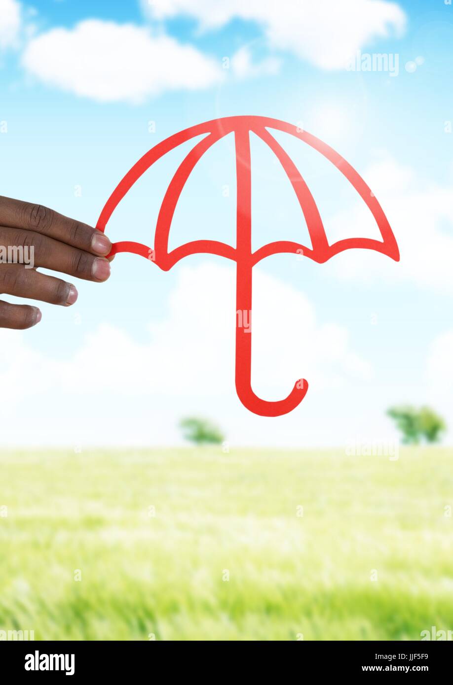 Digital composite of Cut out umbrella protection in landscape Stock Photo