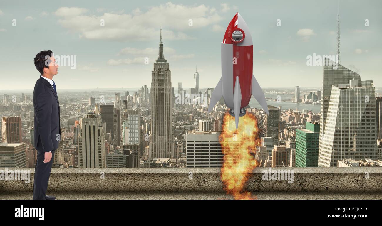 Digital composite of Digital composite image of businessman looking at  rocket launch in city Stock Photo