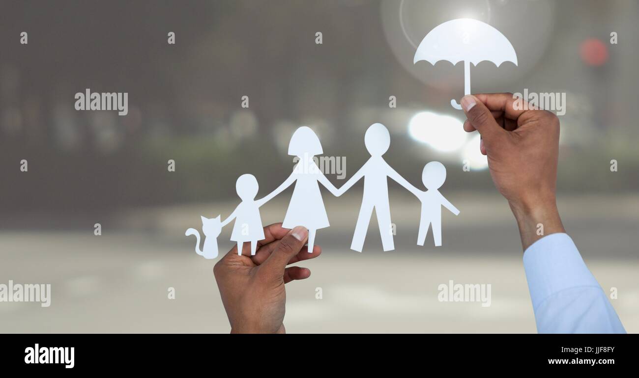 Digital composite of Cut outs family under protective umbrella Stock