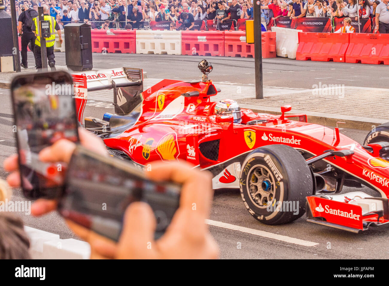 'F1 Live' Event in London with cars being driven along Whitehall Stock Photo