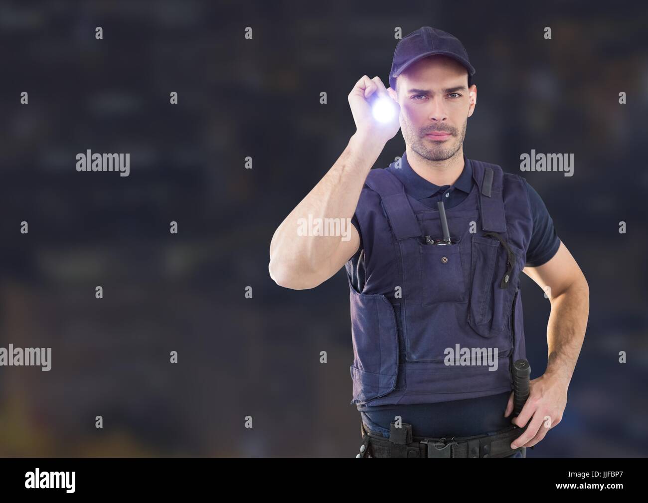 Securityman Photopc Digital composite of Security man outside in night city Stock Photo - Alamy