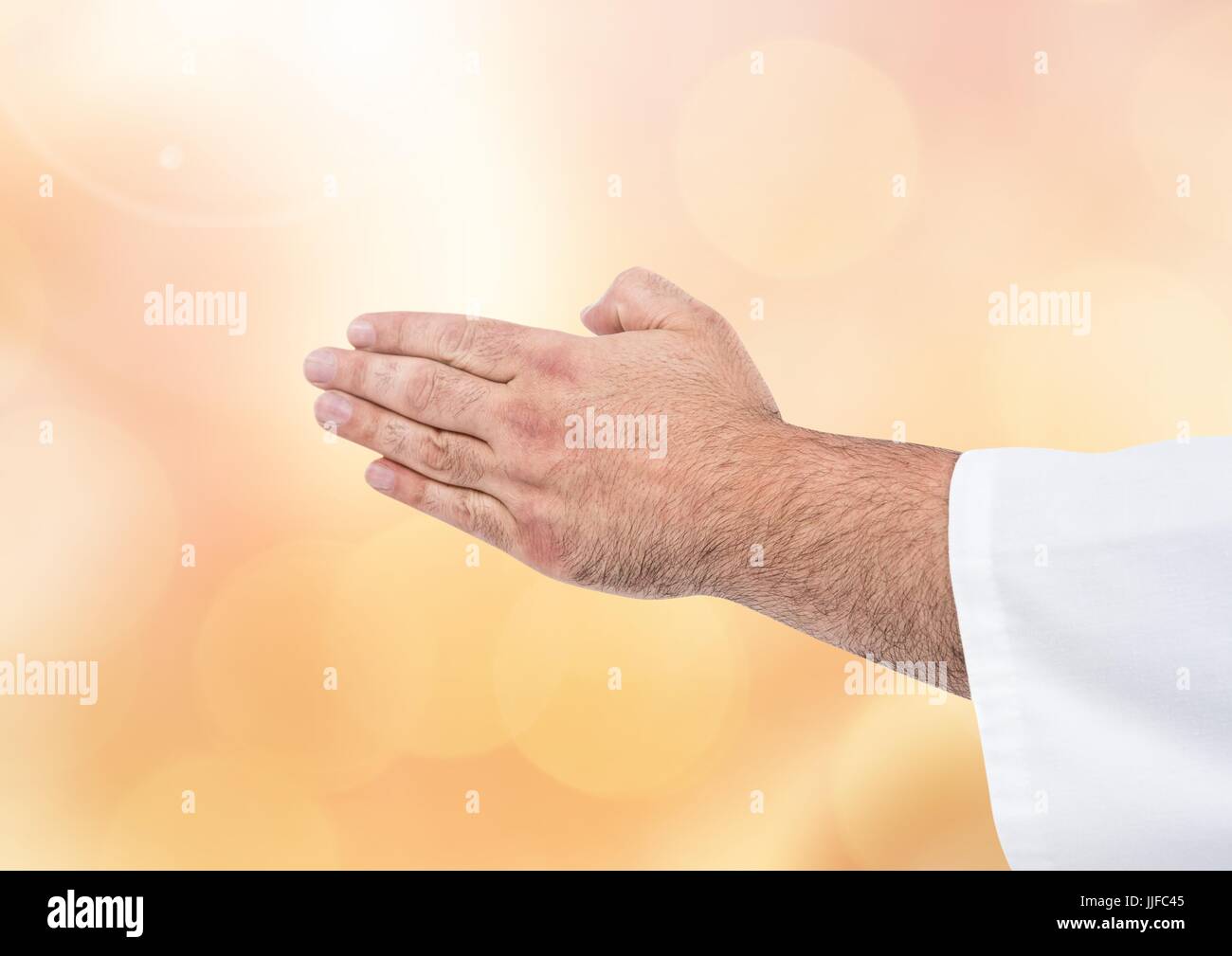 Man praying meditating kneeling hi-res stock photography and images - Alamy