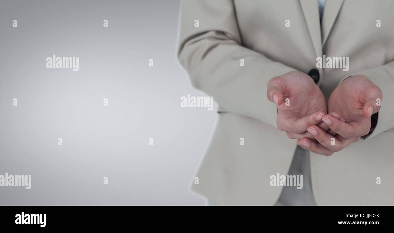 Digital composite of Hands cupped Stock Photo