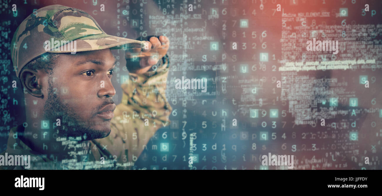 Close up of soldier saluting against dark room Stock Photo - Alamy