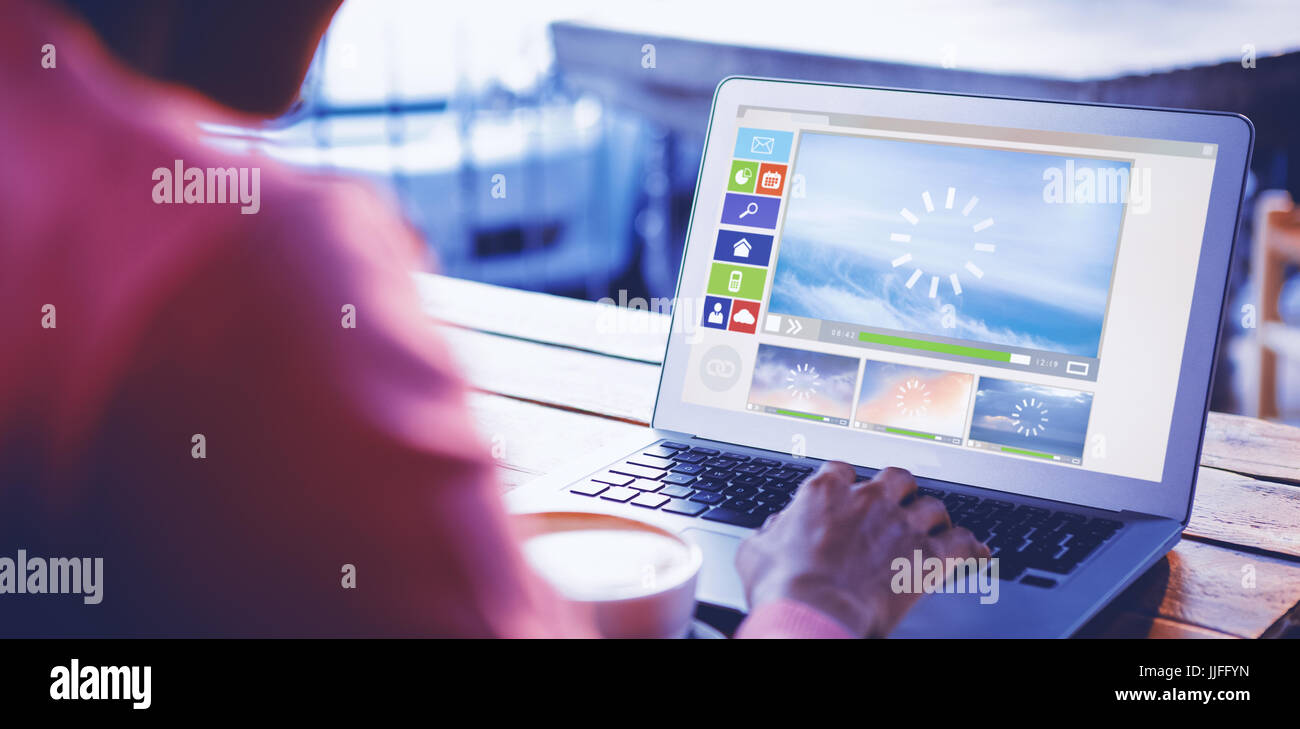Illustration of various video and computer icons against woman using ...