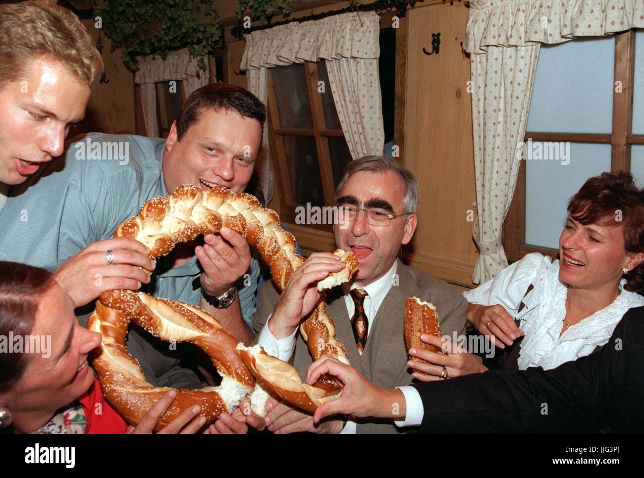 Oktoberfest in Munich. Giant pretzel is big enough for all. Treasury