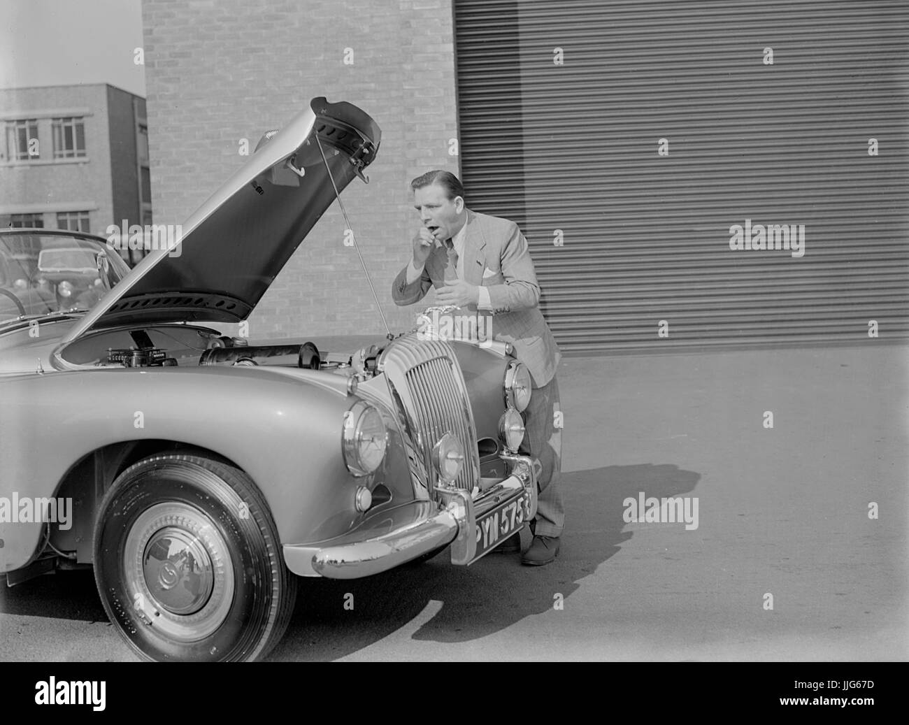 1955 Daimler Conquest Drophead Coupe, Hooper body. Norman Wisdom, featured in the film 'Up In The World'. Stock Photo