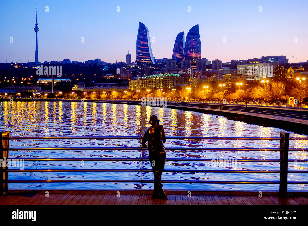 Fisherman statue on the Baku pier, Azerbaijan Stock Photo