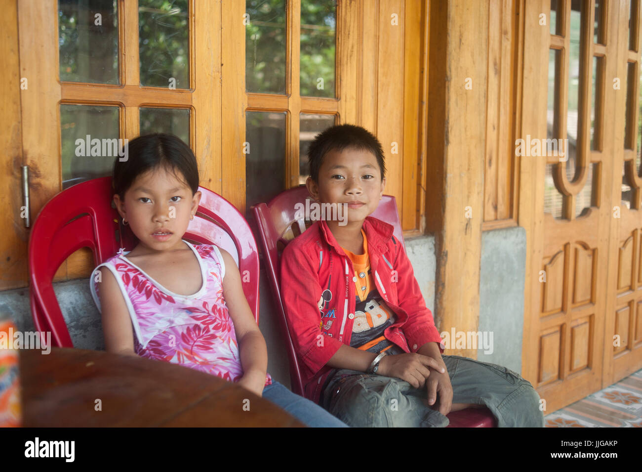 Sapa, North  Vietnam -  A boy and a little girl looking at camera Stock Photo
