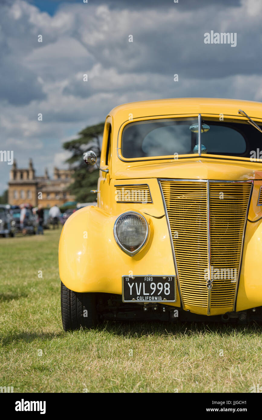 1937 Yellow Ford street rod coupe at Rally of the Giants american car show, Blenheim palace, Oxfordshire, England. Classic vintage American car Stock Photo