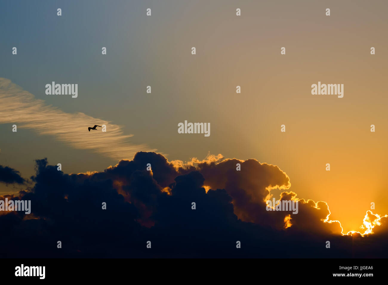 Beautiful colorful sunset / sunrise sky with the clouds Stock Photo - Alamy