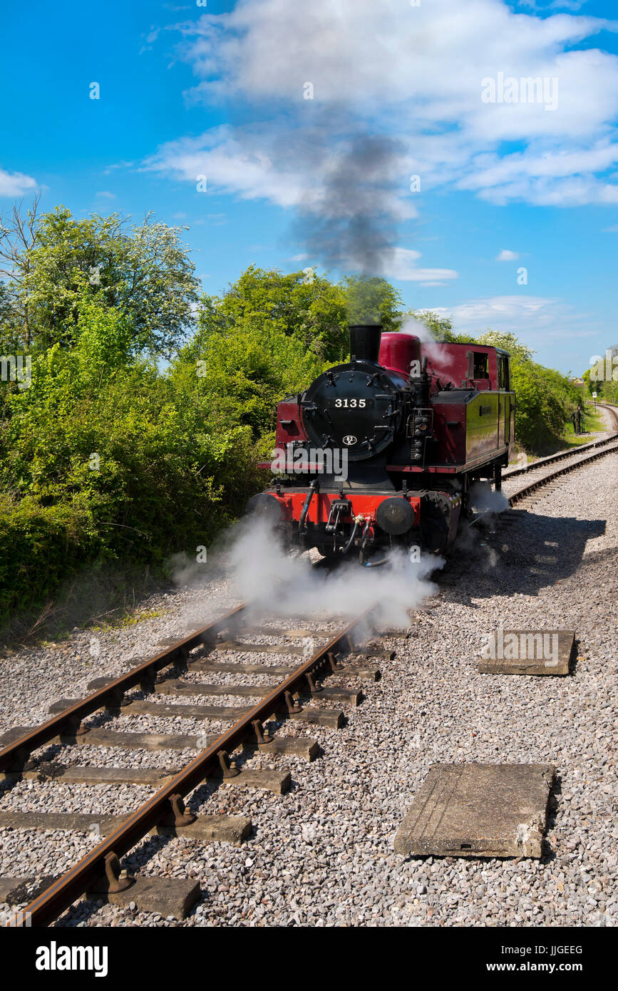 Vertical view of a steam locomotive in the sunshine. Stock Photo