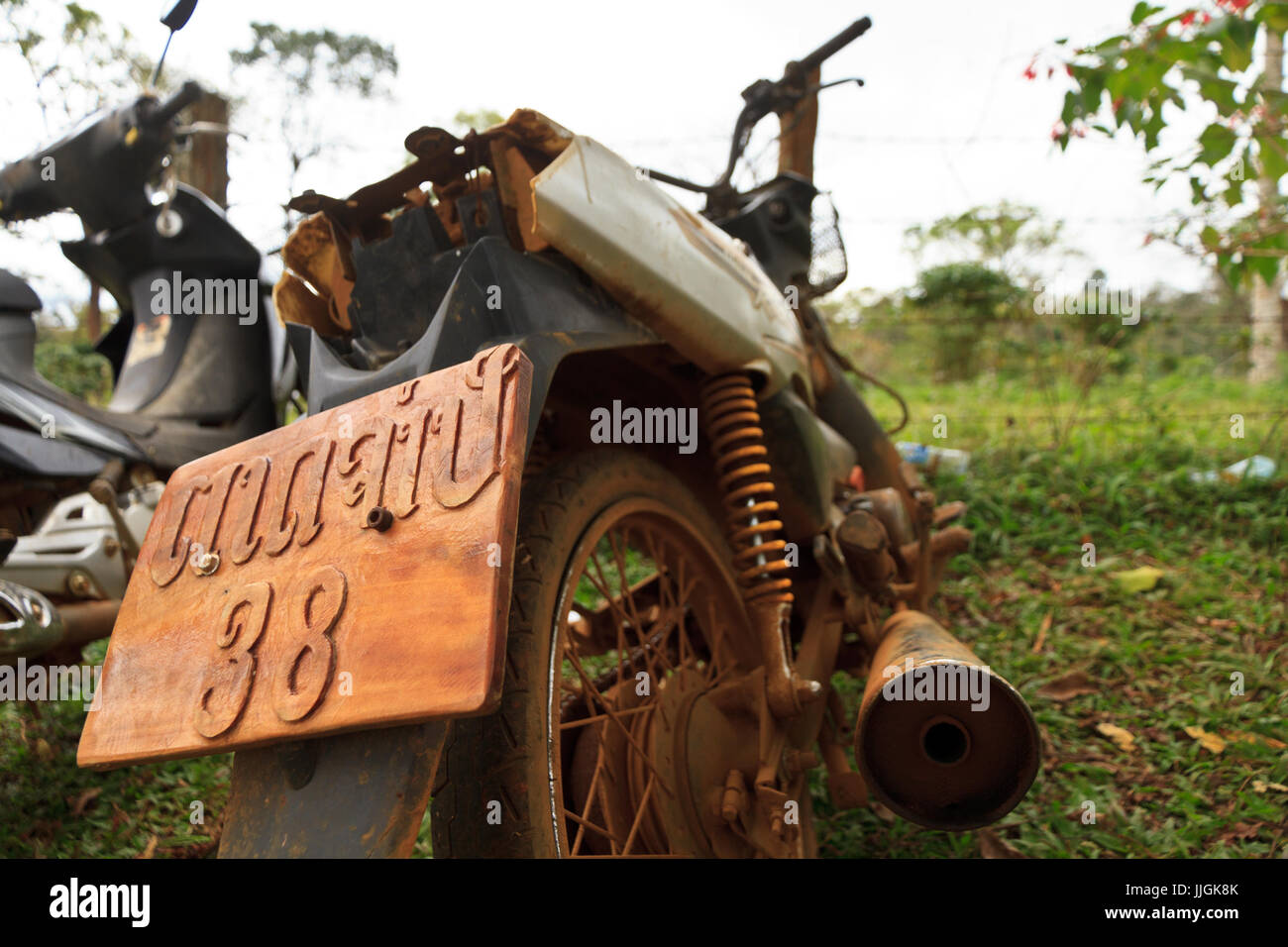 Wonderful material wood. Handmade license plate for a motorbike in laos asia Stock Photo