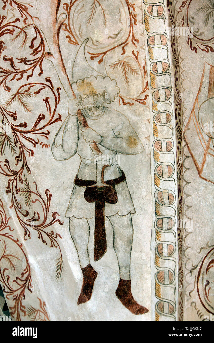Danish nedieval religious fresco in Undloese Church depicting a soldier painted by the Isefjord Master from aoeund year 1450 A.D. Stock Photo