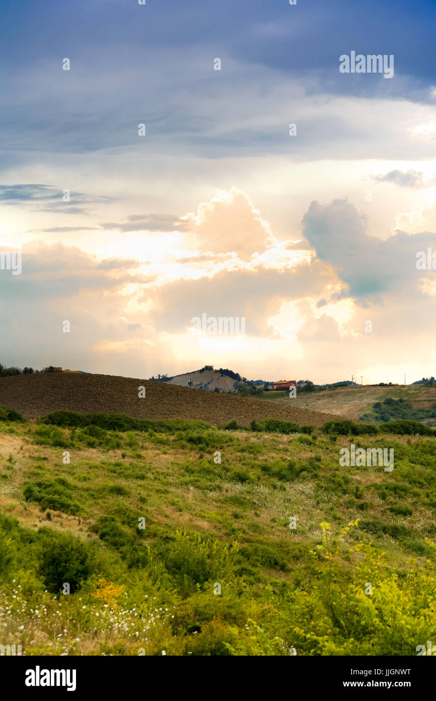 Panorama of green Tuscan hills on a rainy and thunderstorm day landscape in italy Stock Photo