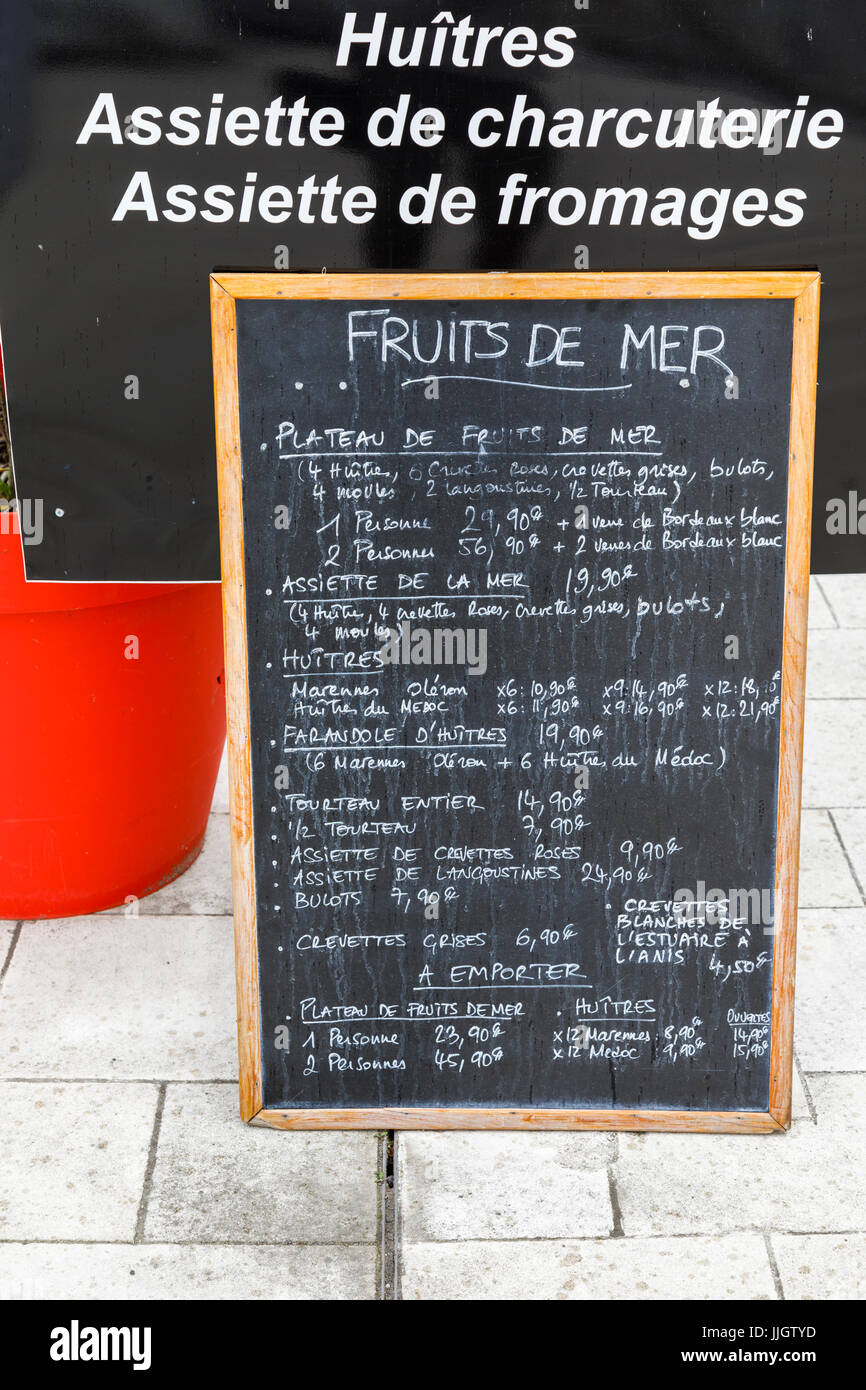 Seafood fruits de mer menu of the day handwritten on a blackboard