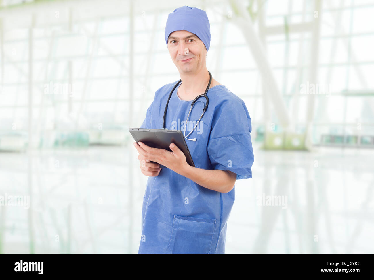 male doctor with tablet at the hospital Stock Photo