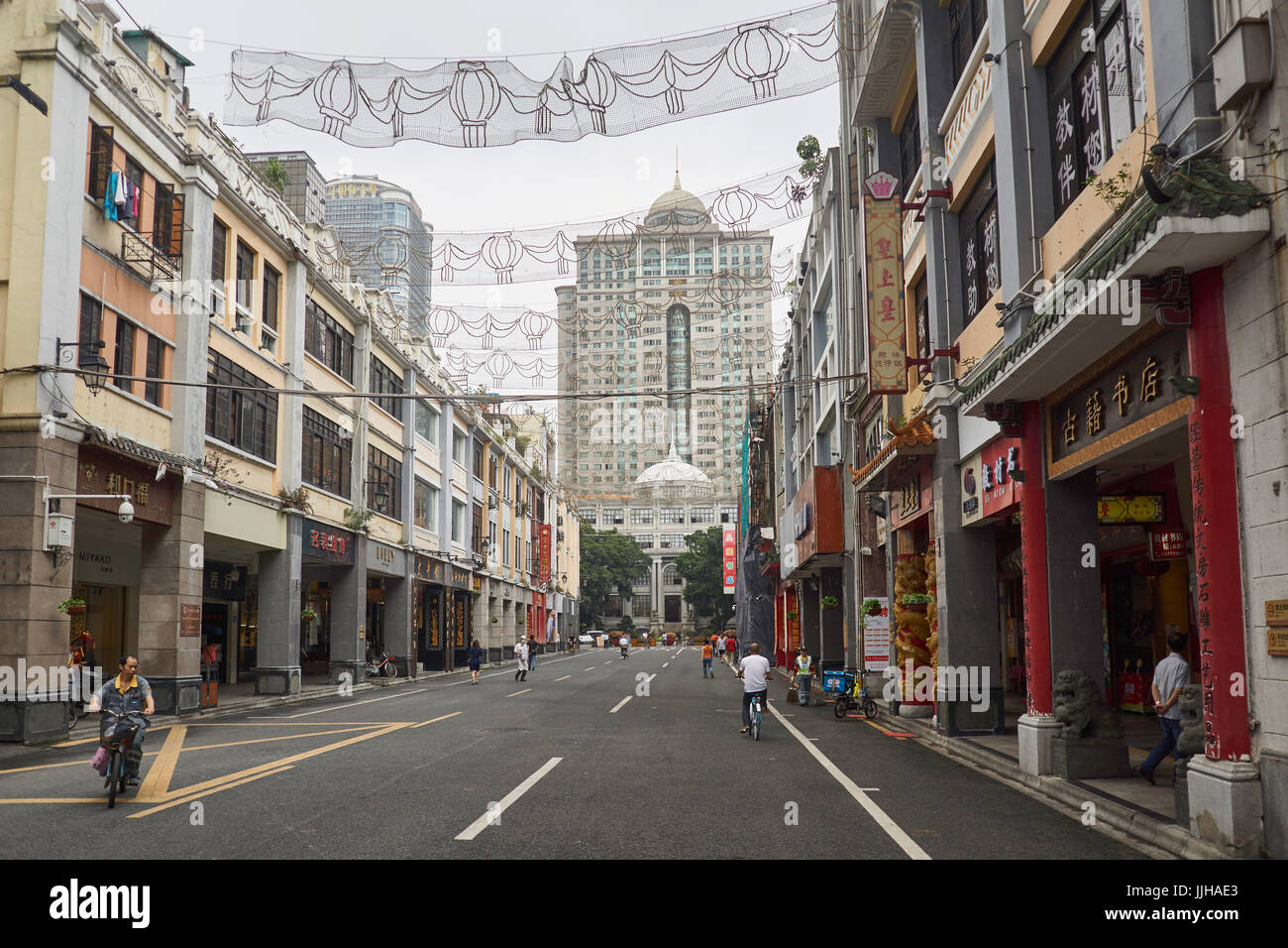 Upper Beijing Lu shopping area with pedestrians and the Guangdong Provincial Finance Bureau - Beijing Road is Guangzhou's old shopping street, China Stock Photo