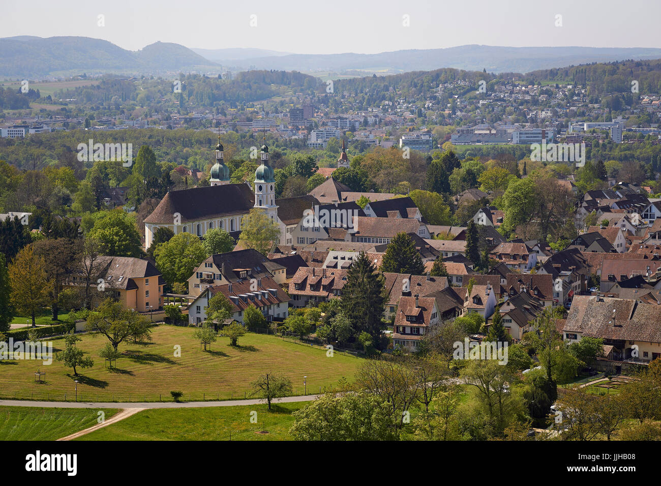 Arlesheim village from above, with the Dom church and green countryside - near Basel, Baselland Kanton, Switzerland Stock Photo