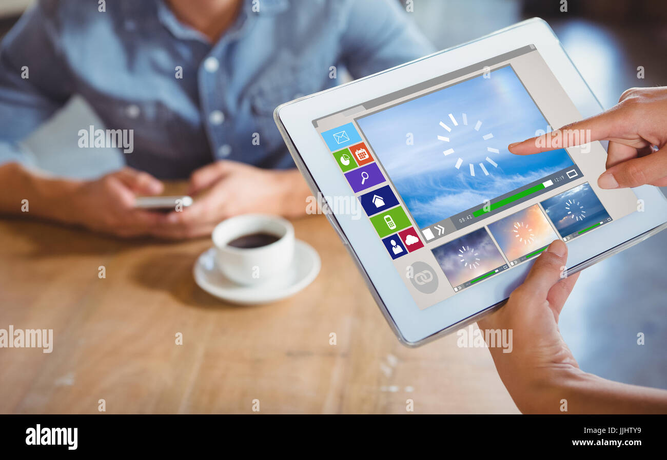 Composite image of various video and computer icons against person ...