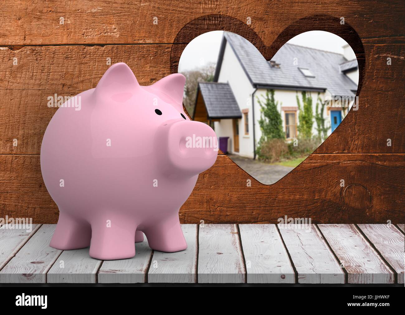 3D pink piggy bank in front of wood with heart hole where we can see a house blue door(blurred) Stock Photo