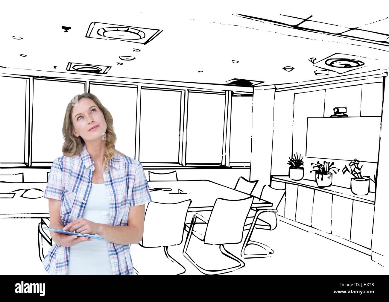 young happy woman with tablet designing the 3d new office Stock Photo