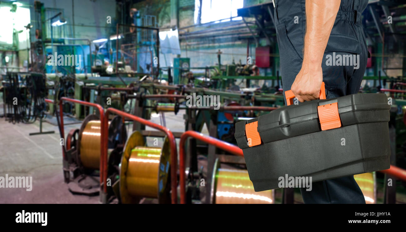 Worker with instruments Stock Photo - Alamy