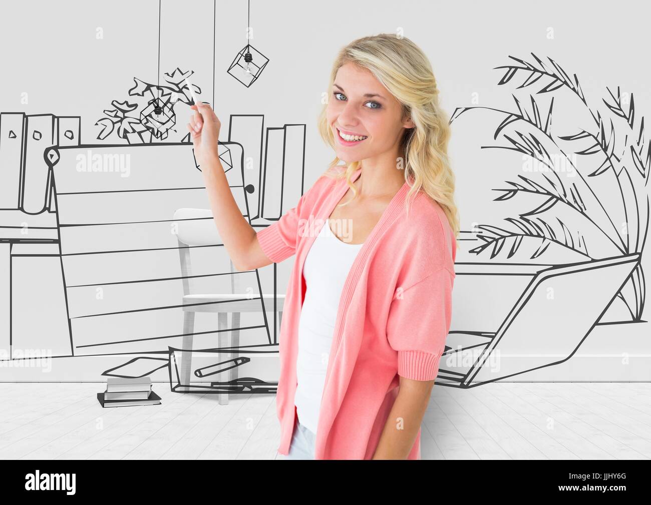 young woman drawing the 3D blueprint of her new office Stock Photo