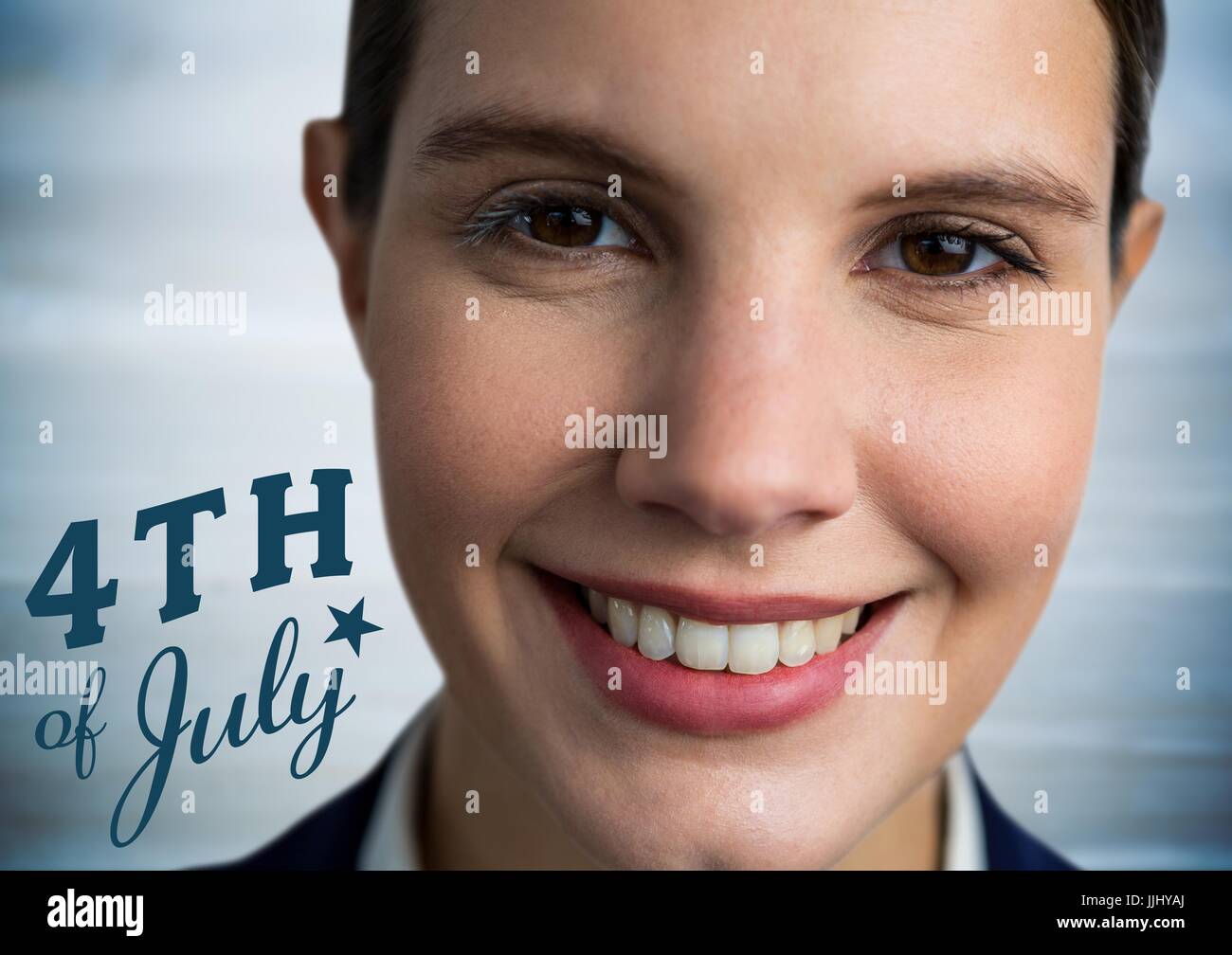 Portraiture of woman with blue fourth of July graphic against blurry blue wood panel Stock Photo