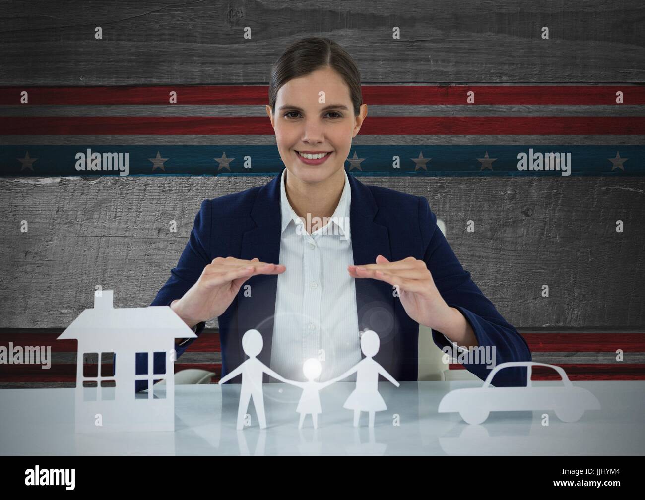 Business woman with house, family and car on paper Stock Photo