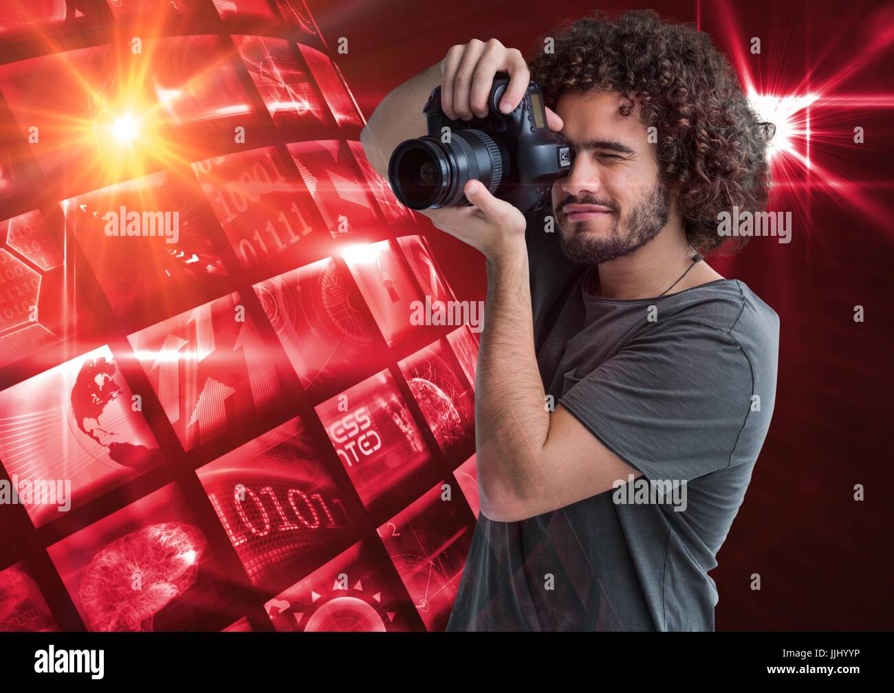 Photographer taking a picture in front of a photo montage frame Stock Photo