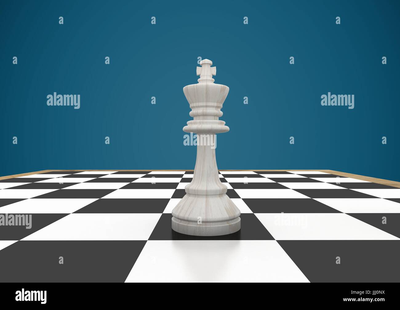 3D Chess piece against blue background Stock Photo
