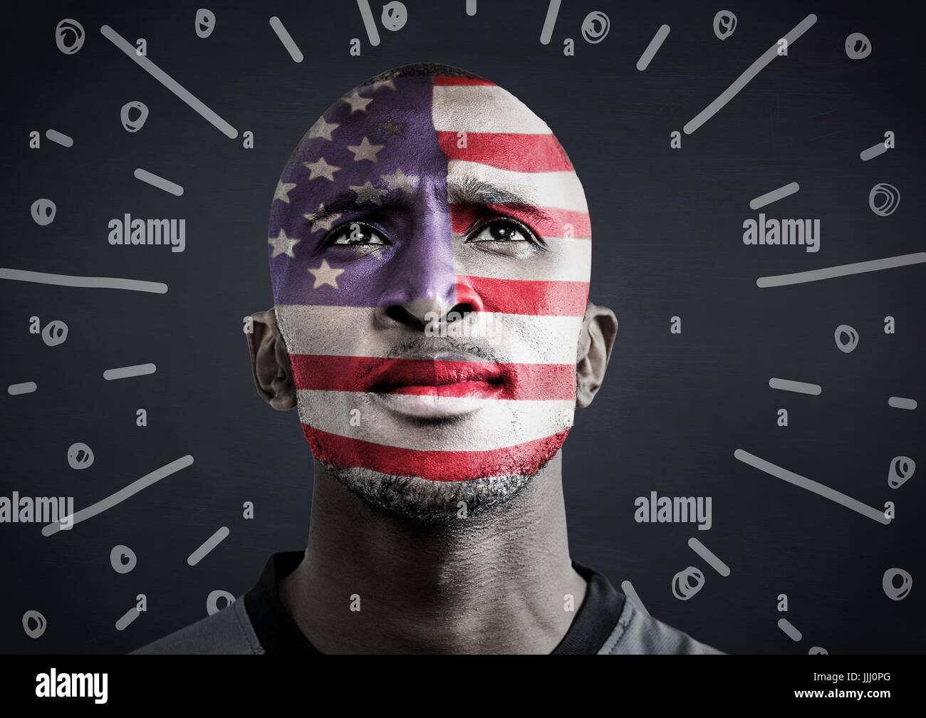 Portraiture of man with american flag face paint against navy chalkboard and white fireworks doodle Stock Photo