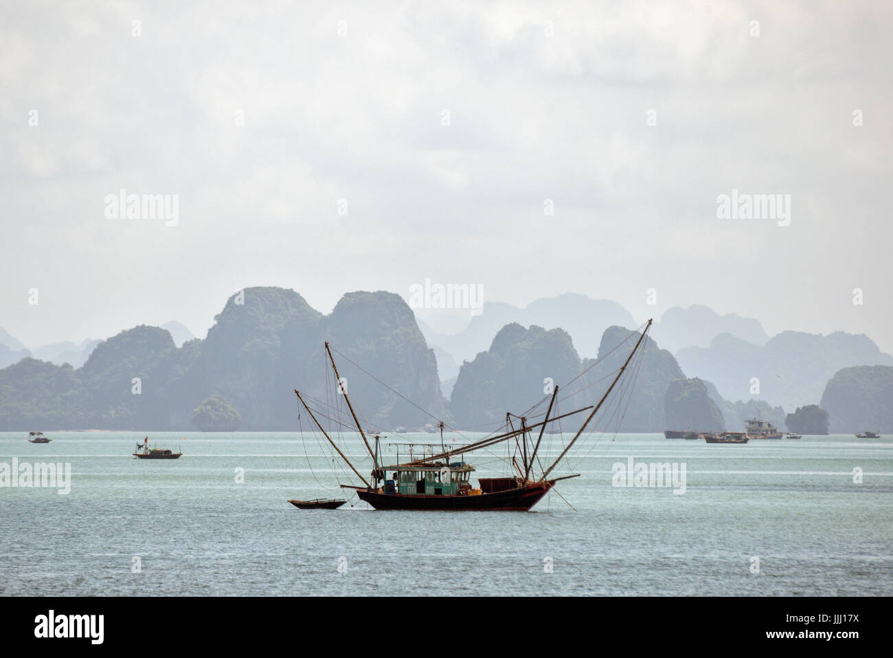 Scenic view of Halong Bay and boat cruising, Vietnam. Stock Photo