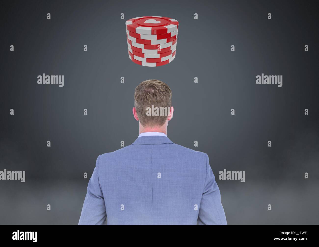 Back of Man Looking at 3d casino poker chips Stock Photo