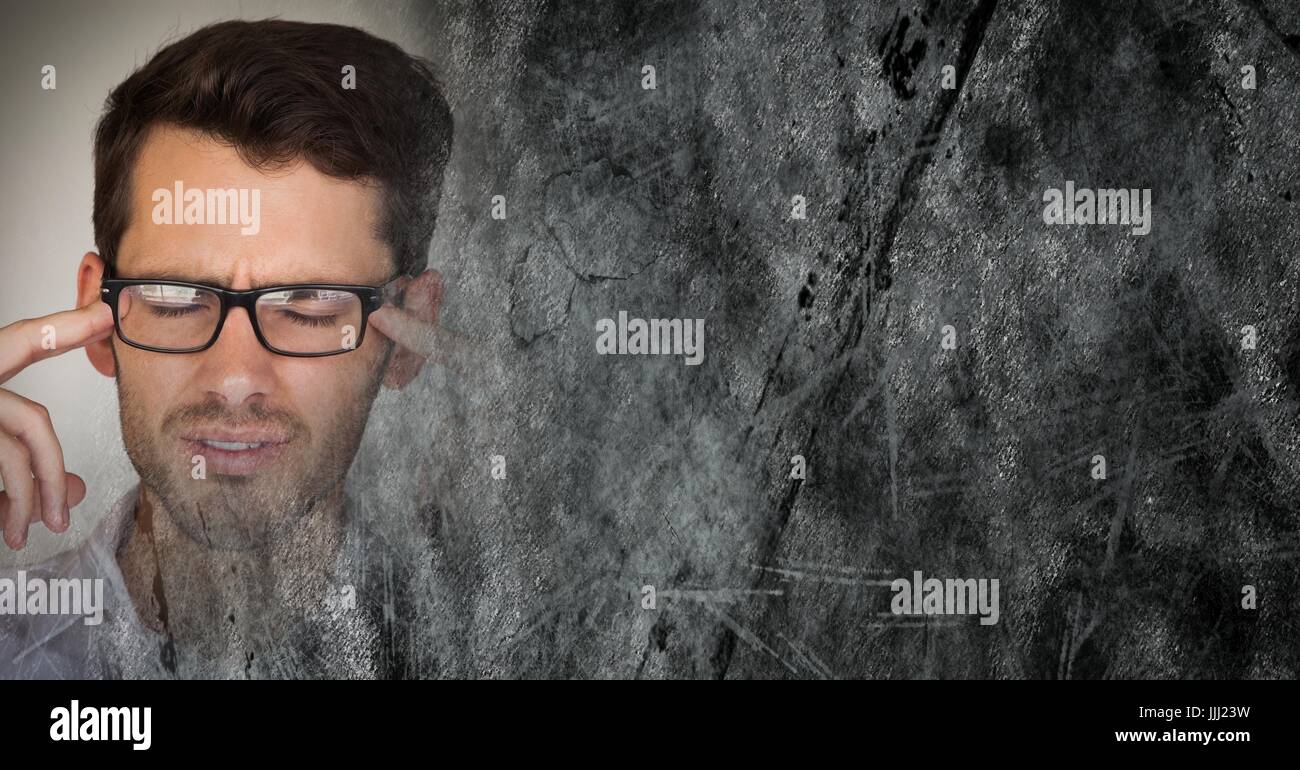 Portraiture of frustrated man with glasses and grey grunge transition and copy space Stock Photo