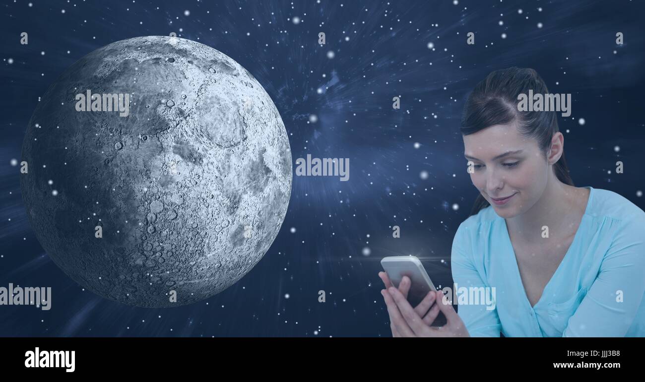 Smiling woman texting against universe background Stock Photo