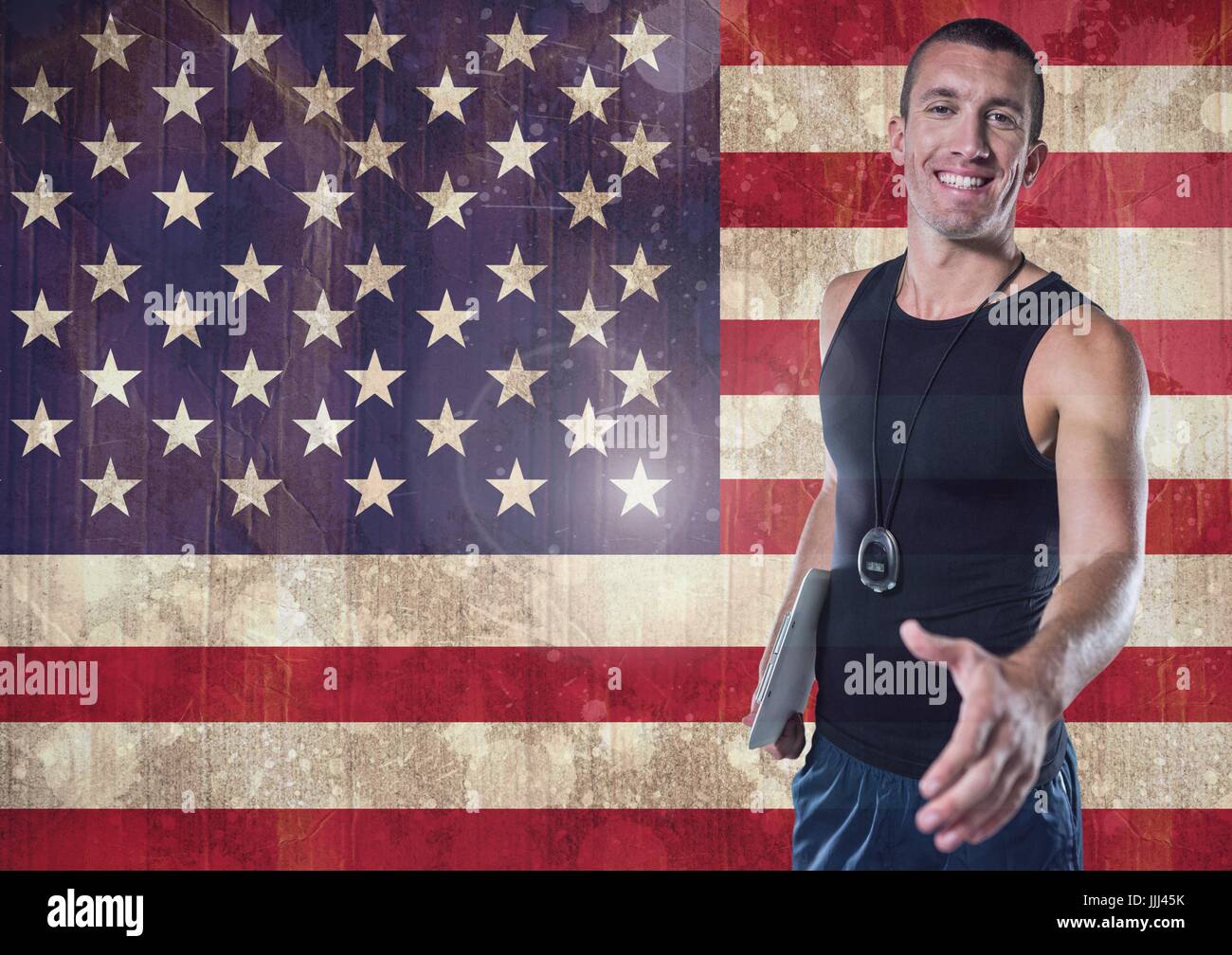 Sport coach shaking his hand against american flag Stock Photo