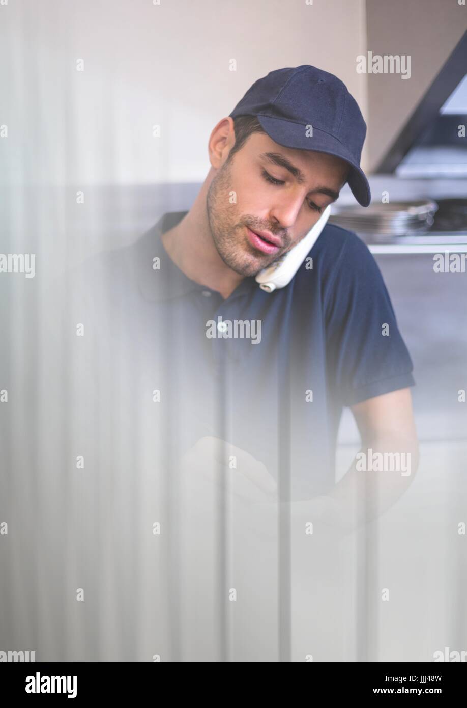 Delivery Courier on phone with transition effect and copy space Stock Photo